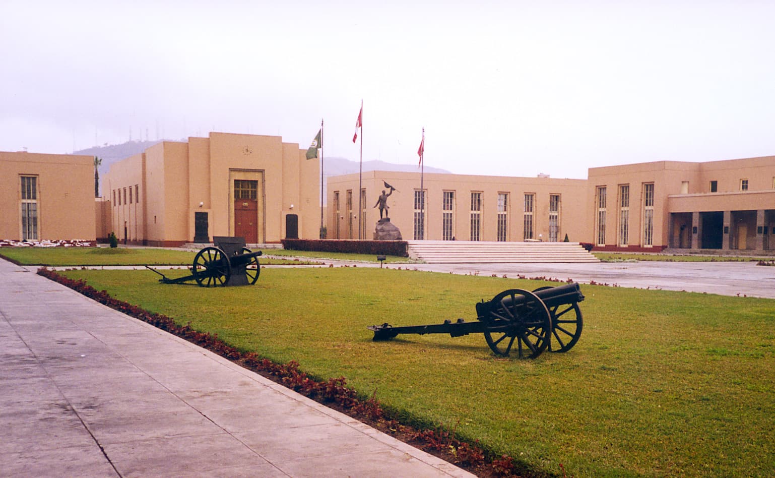The parade ground and ochre buildings of the Military Academy of Chorrillos in Lima, Peru